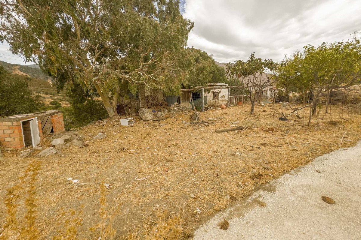 Land with Ruin in Casares