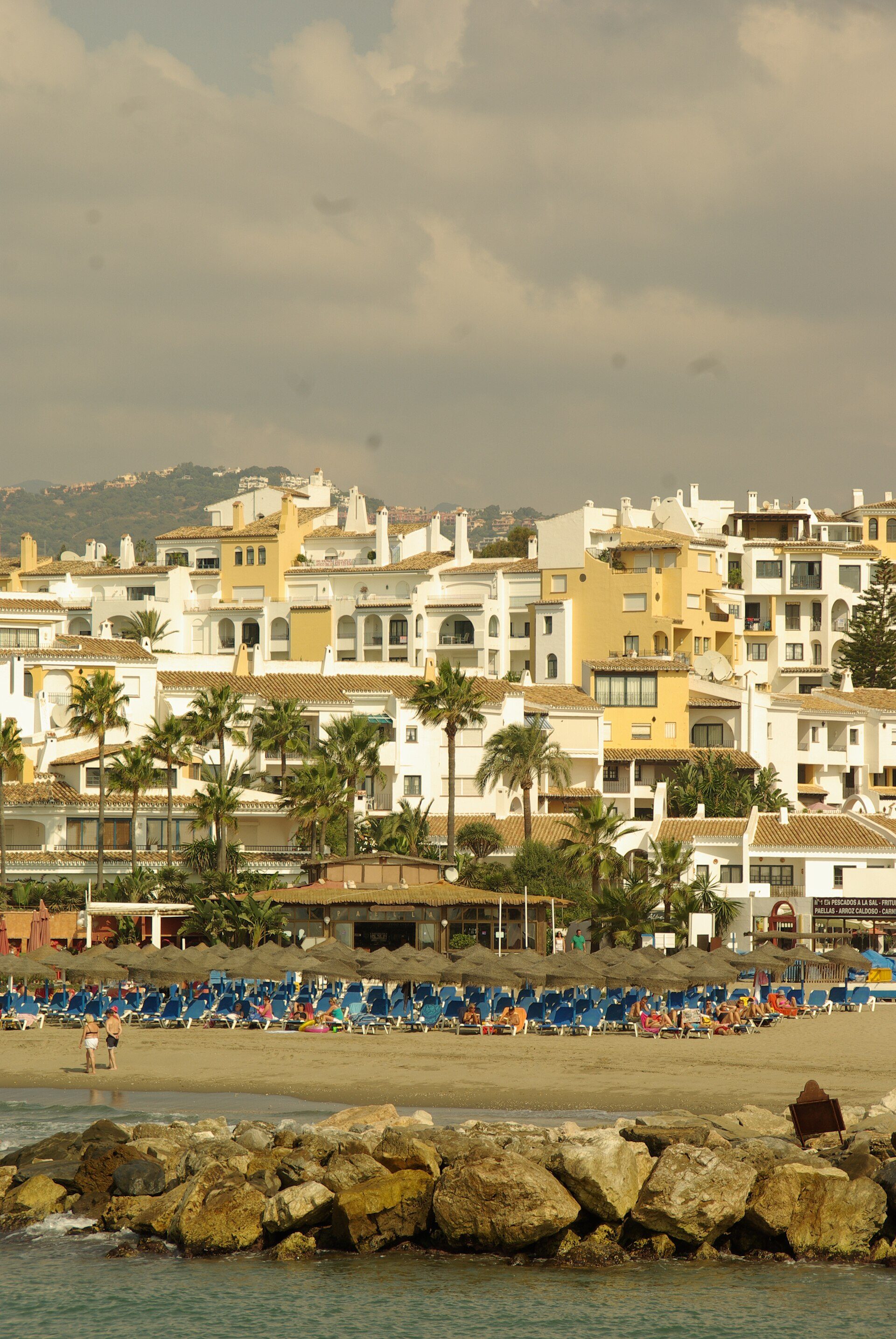 Cozy beachfront apartment with sea view, balcony, and modern amenities.