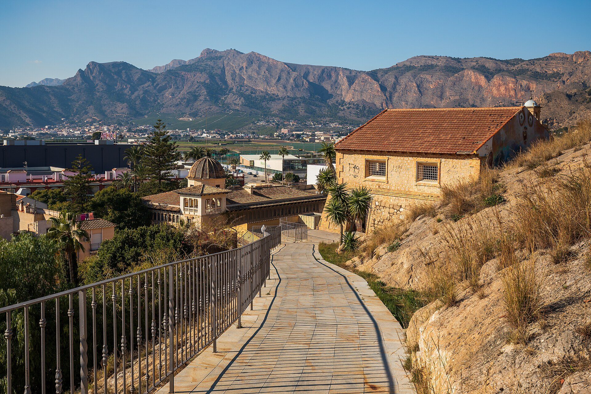 Alt text: Spacious room with mountain view, balcony, and modern amenities.