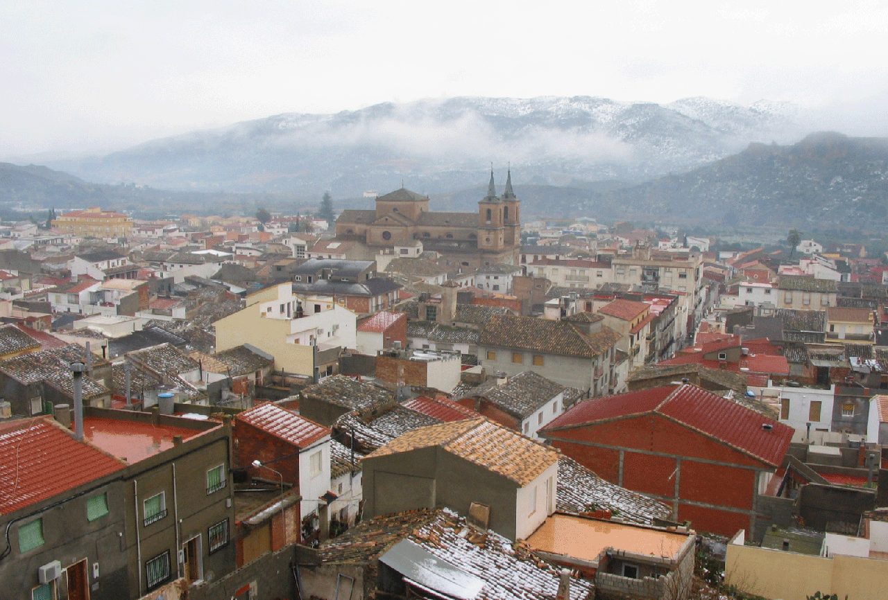 View from the single spire church over the rooftops towards the twin spire churc