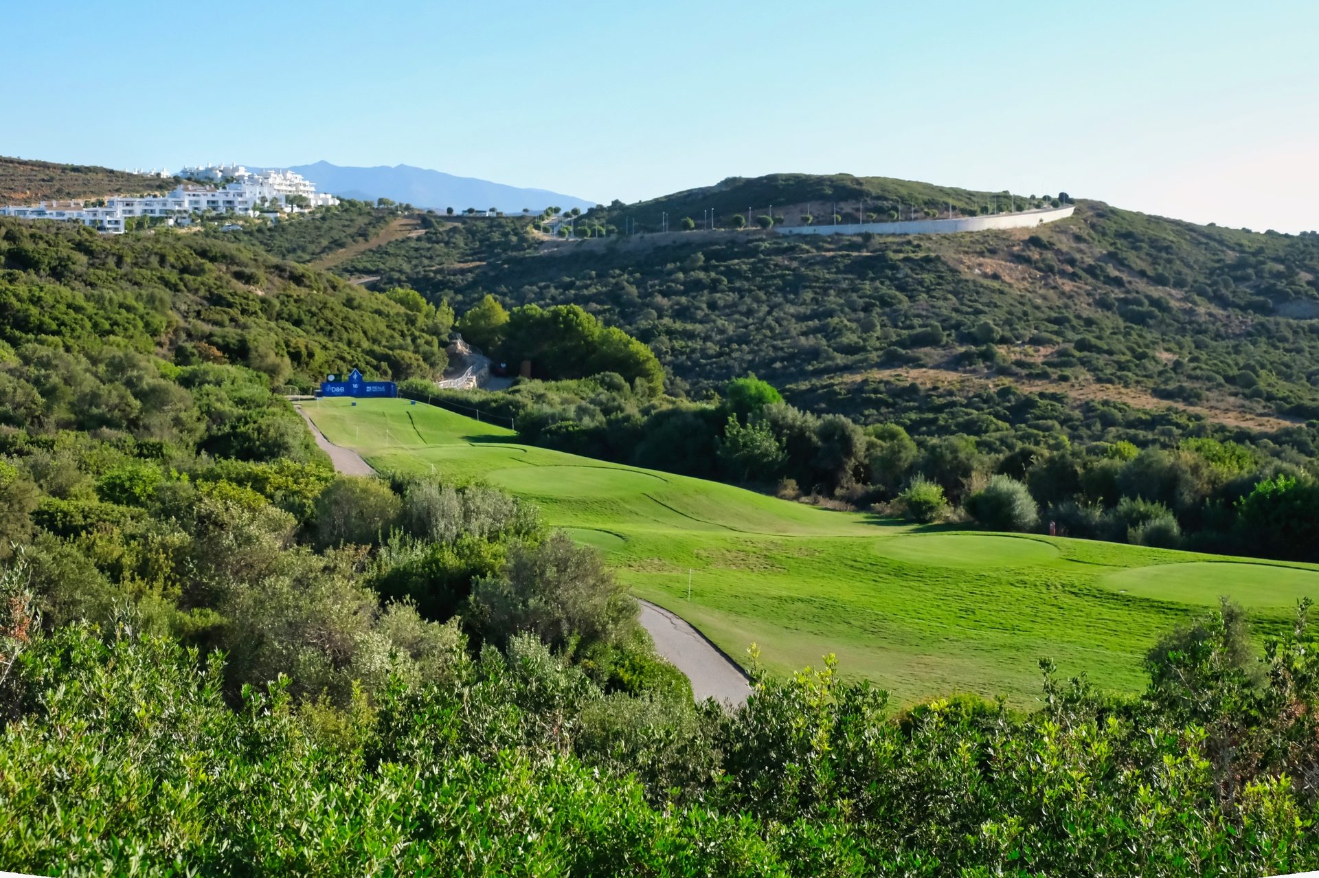 Luxury villa with private pool, scenic golf course and ocean view.