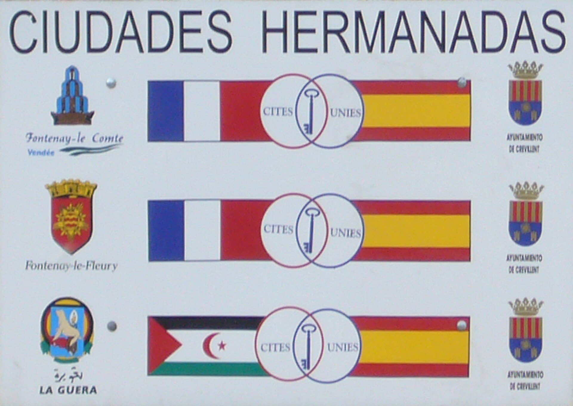 Alt text: Room with city view, featuring a balcony and modern decor.