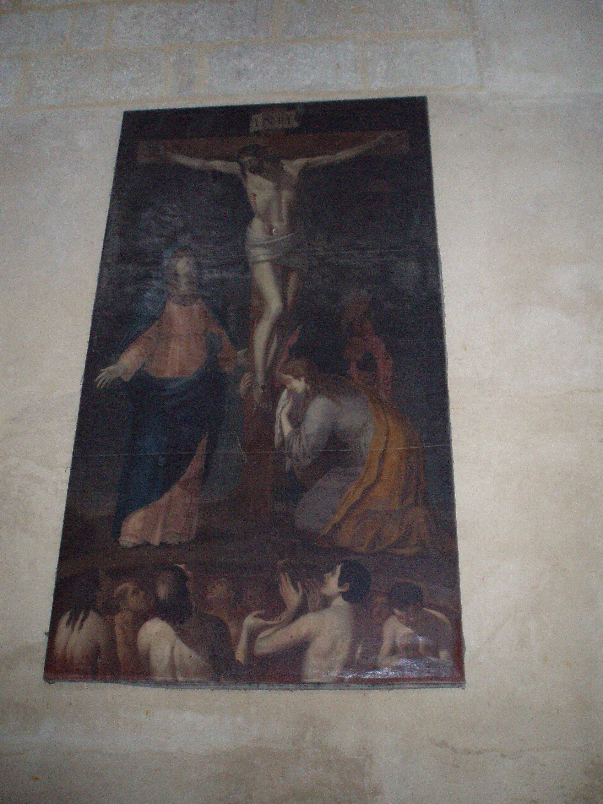 Religious painting depicting Jesus on the cross with mourners below.