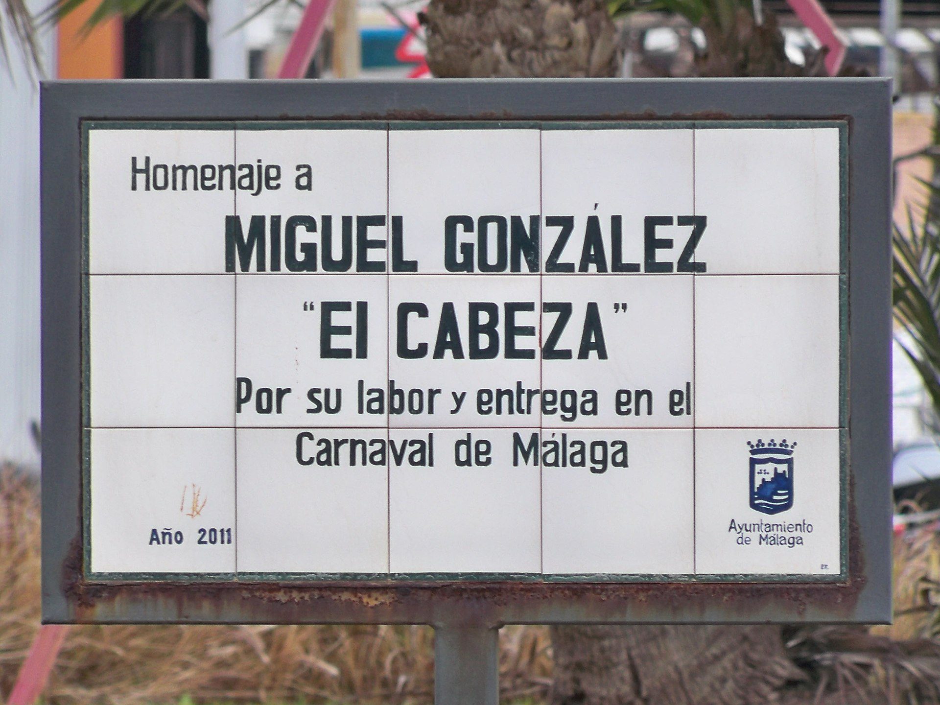 Sign for Miguel Gonzalez "El Cabeza" in Malaga, Spain, commemorating his work in the Carnival.