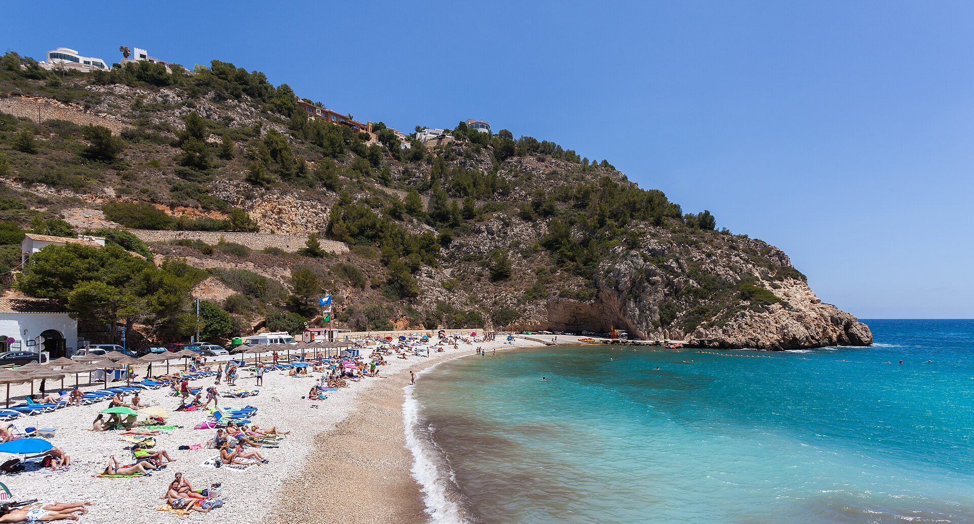 Beachfront room with stunning ocean view, private balcony, and modern amenities.