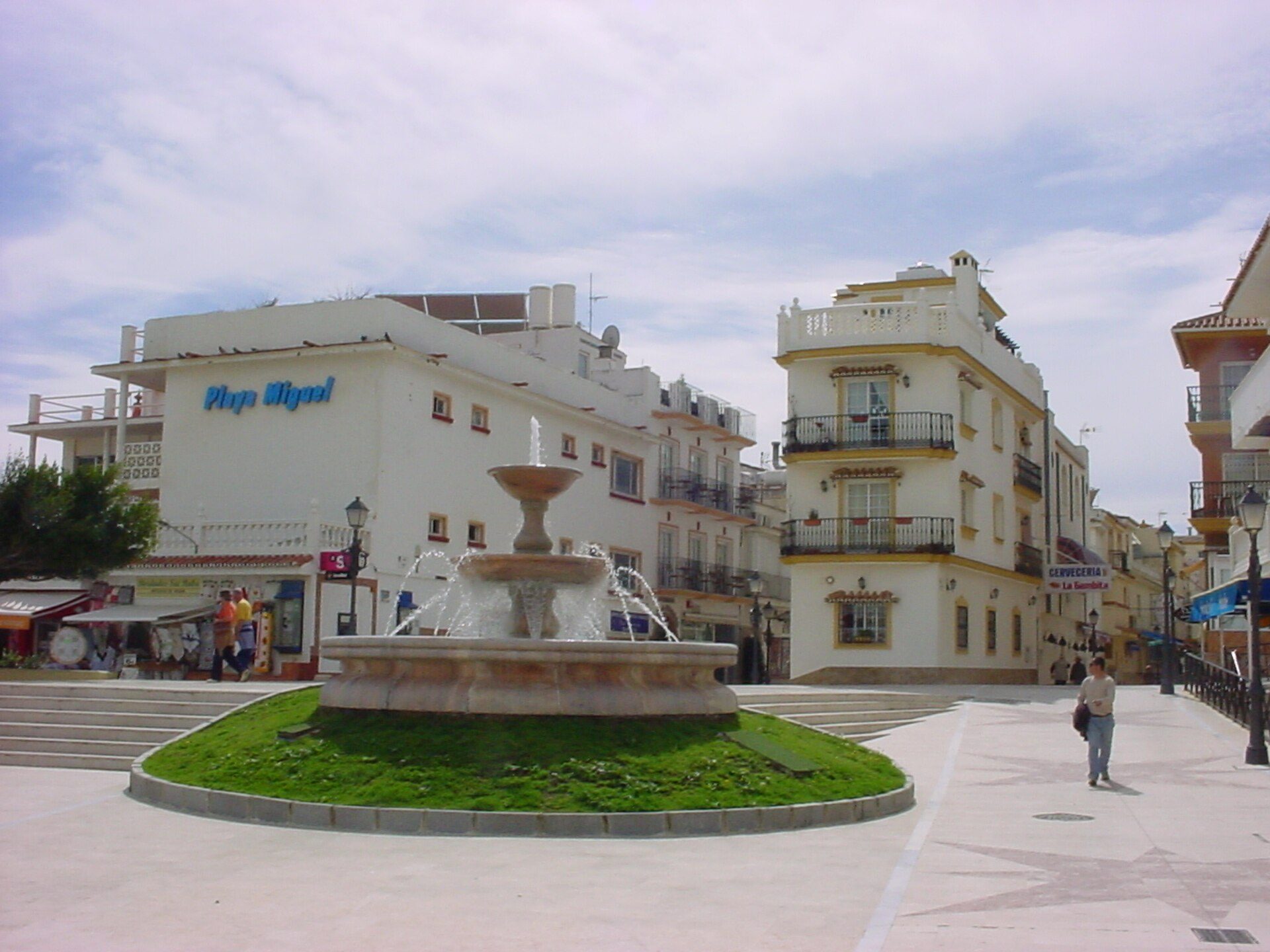 Alt text: Spacious room with balcony, city view, modern amenities.