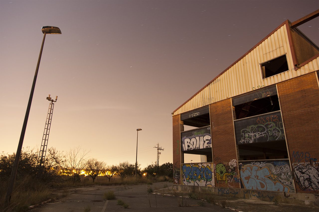 500px provided description: Abandoned industrial building at night. Part of a fo