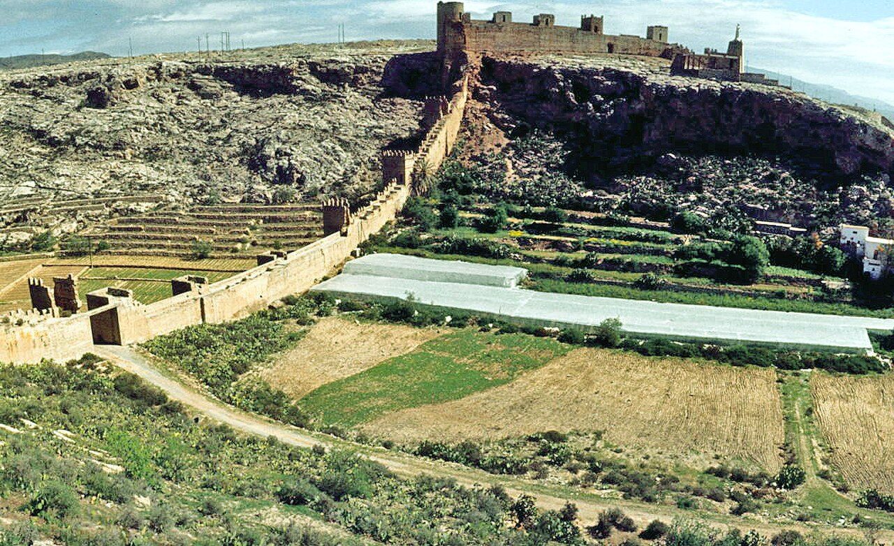 The city walls in San Cristóbal Hill side, with a agricultural explotation insid