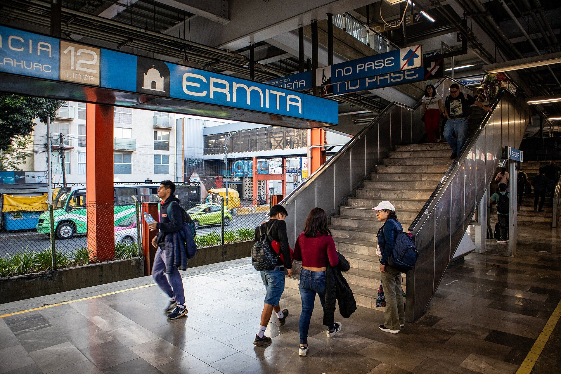 Alt text: Interior view of a modern room with a cityscape through the window.