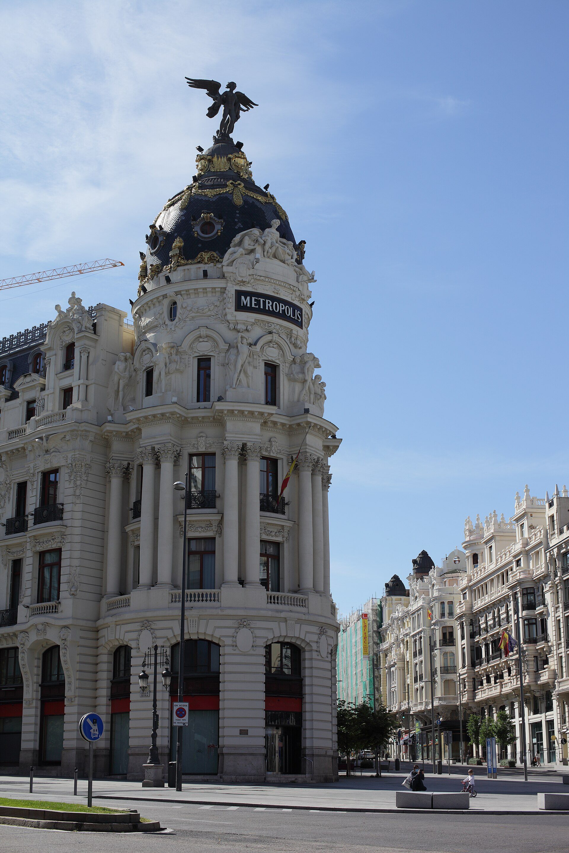 Luxurious hotel room with city view, featuring elegant decor and modern amenities.