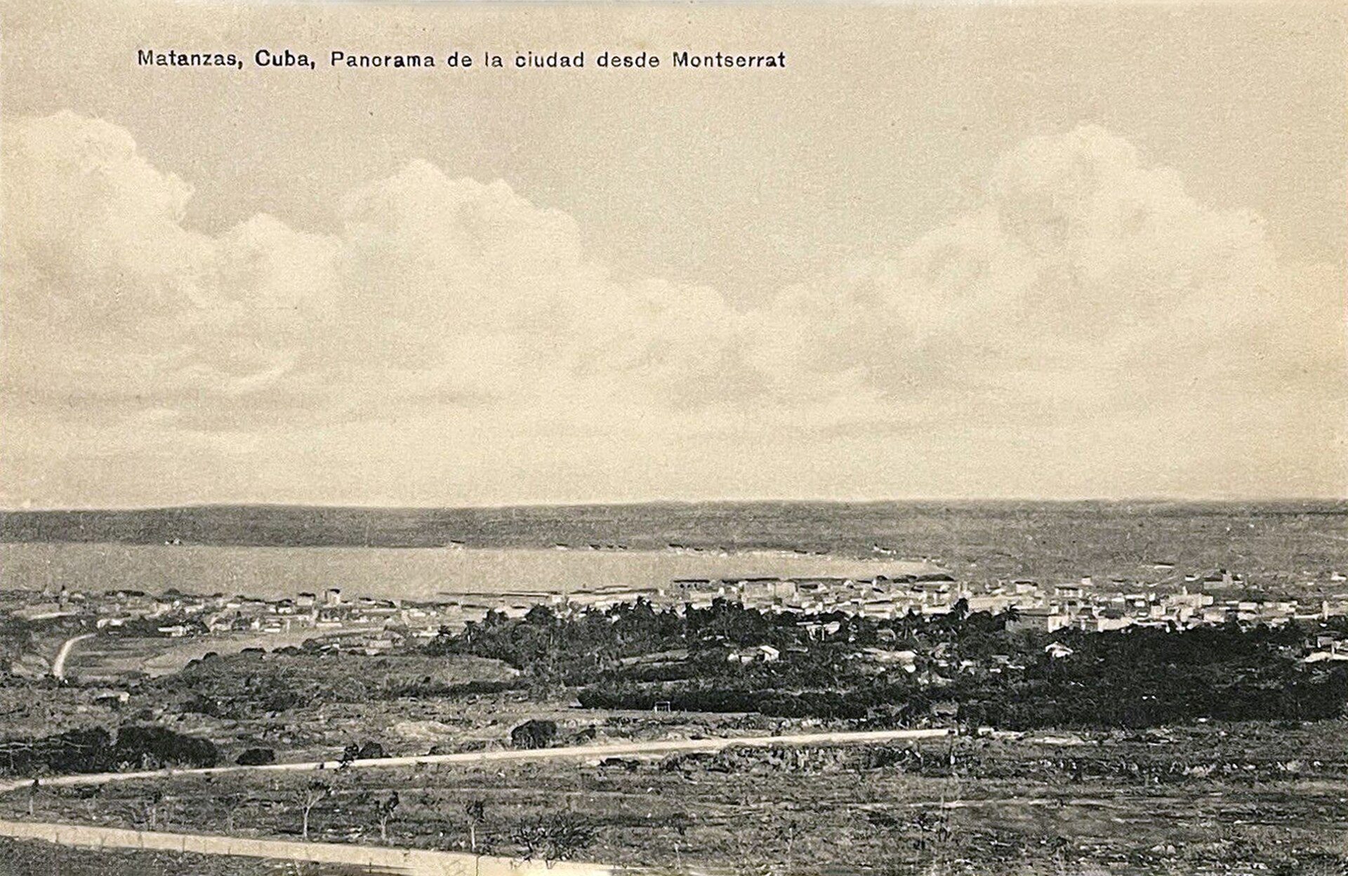 Panoramic view of Matanzas, Cuba, with a cityscape and water body in the background.