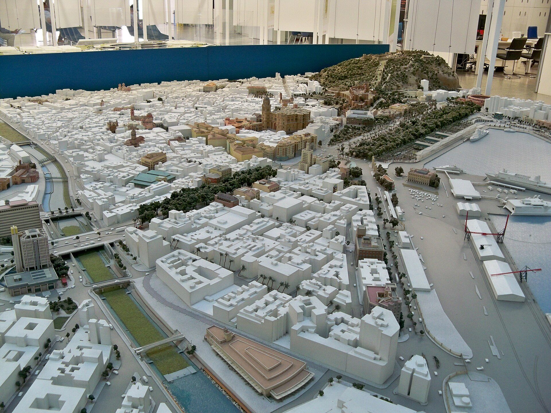 Detailed scale model of a cityscape with buildings, roads, and waterways.