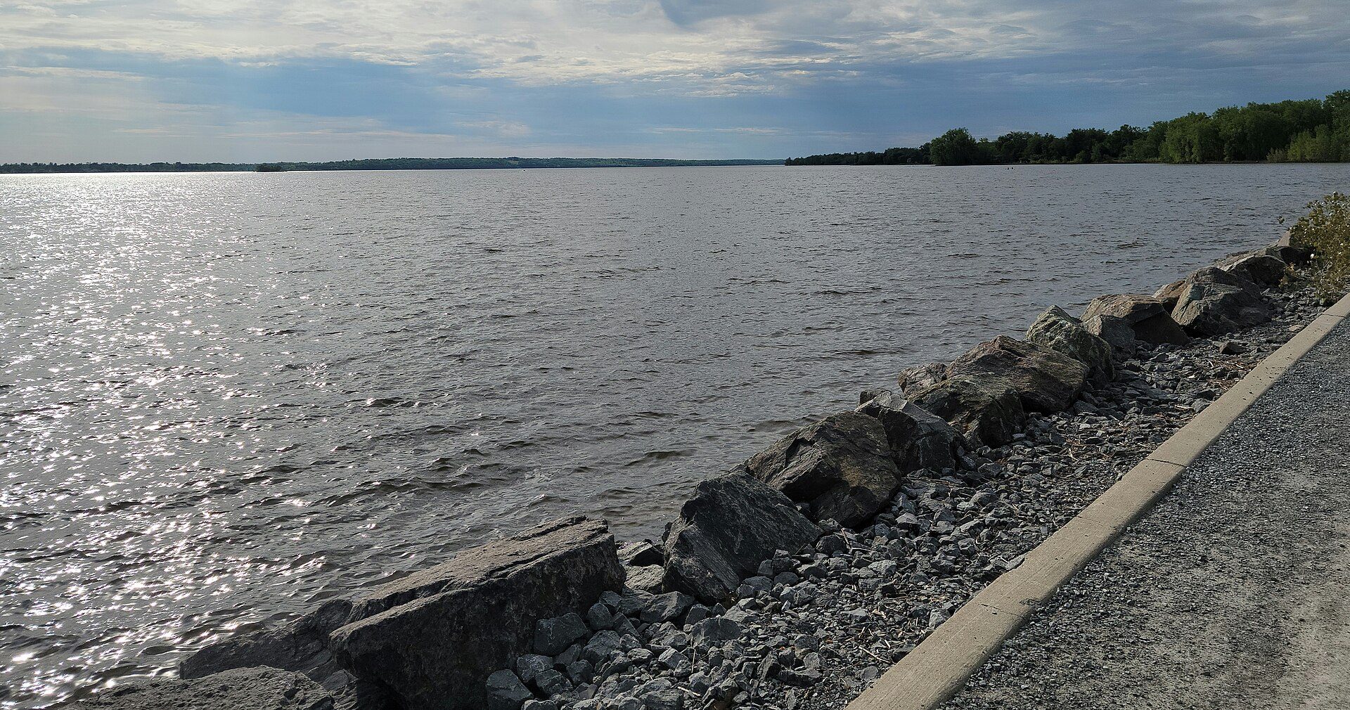 View of the rock jetty on the north shore of the Ottawa River at the Aylmer Mari