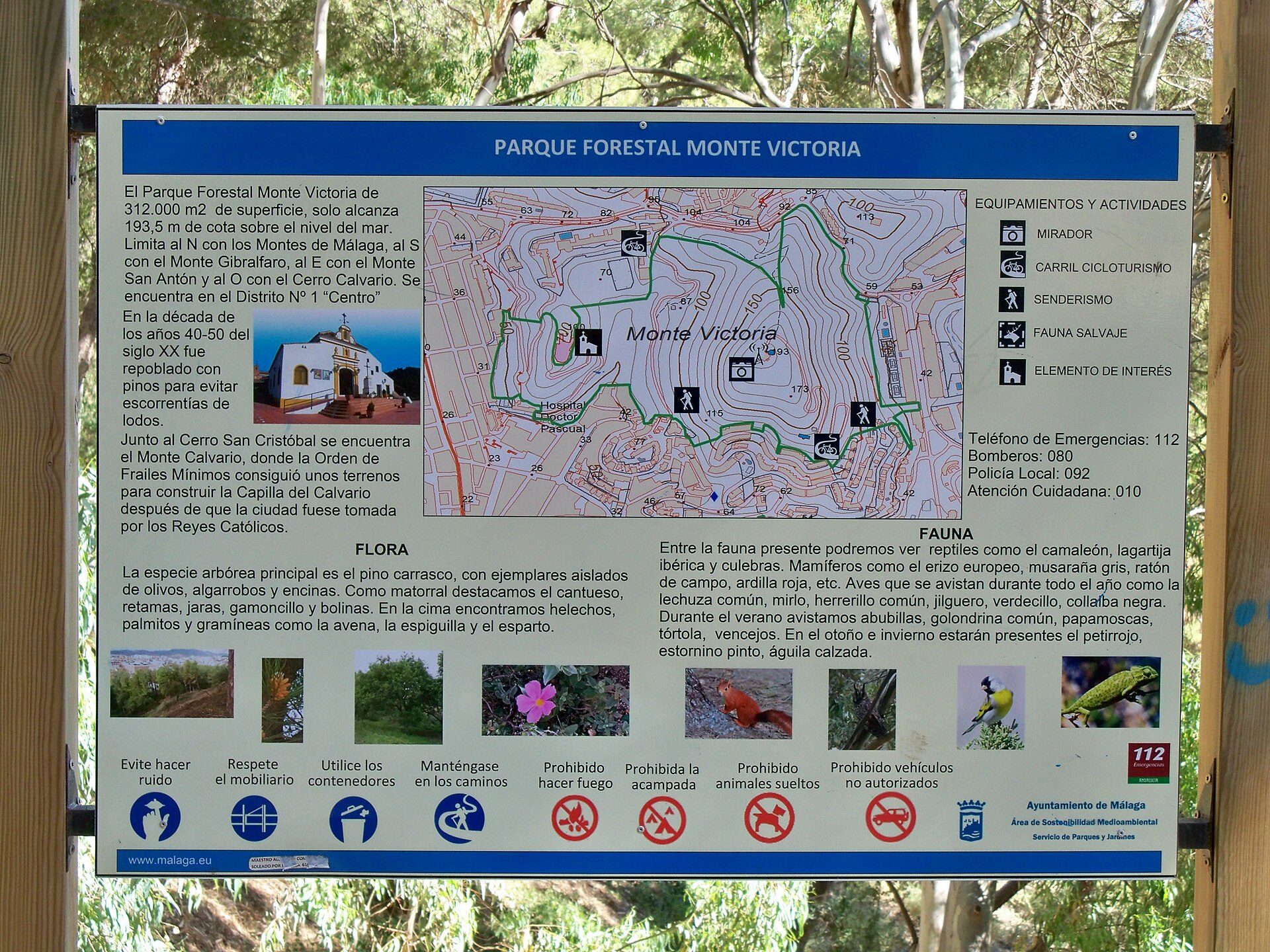 A map of Parque Forestal Monte Victoria with trail information and a photo of a building.
