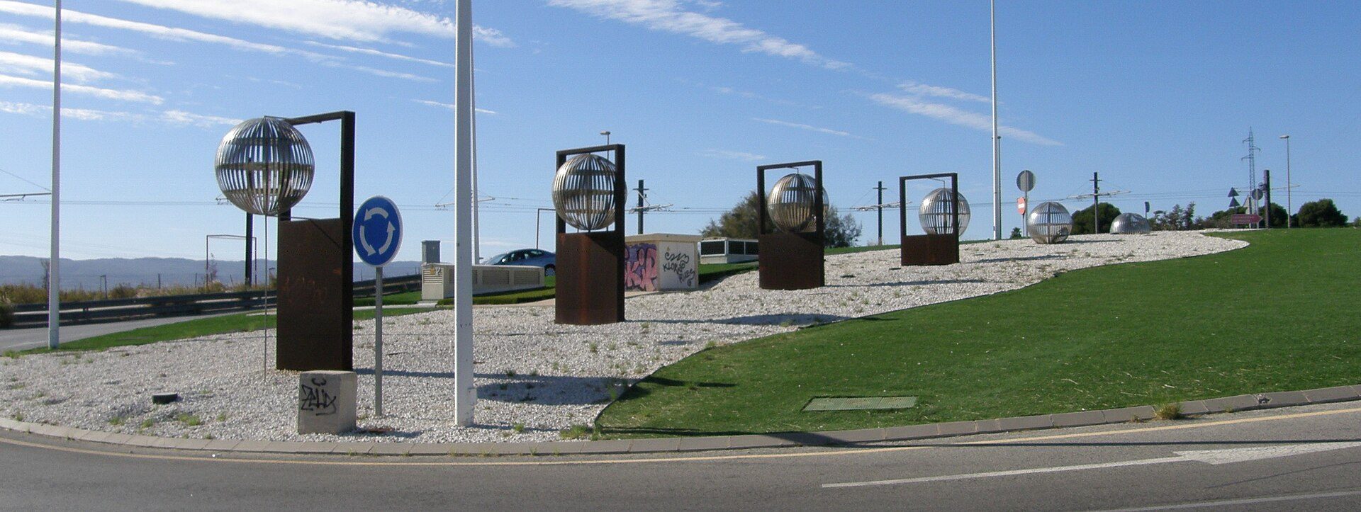 Monumental roundabout "Structure of Time" located in the area of Myrtea Shopping