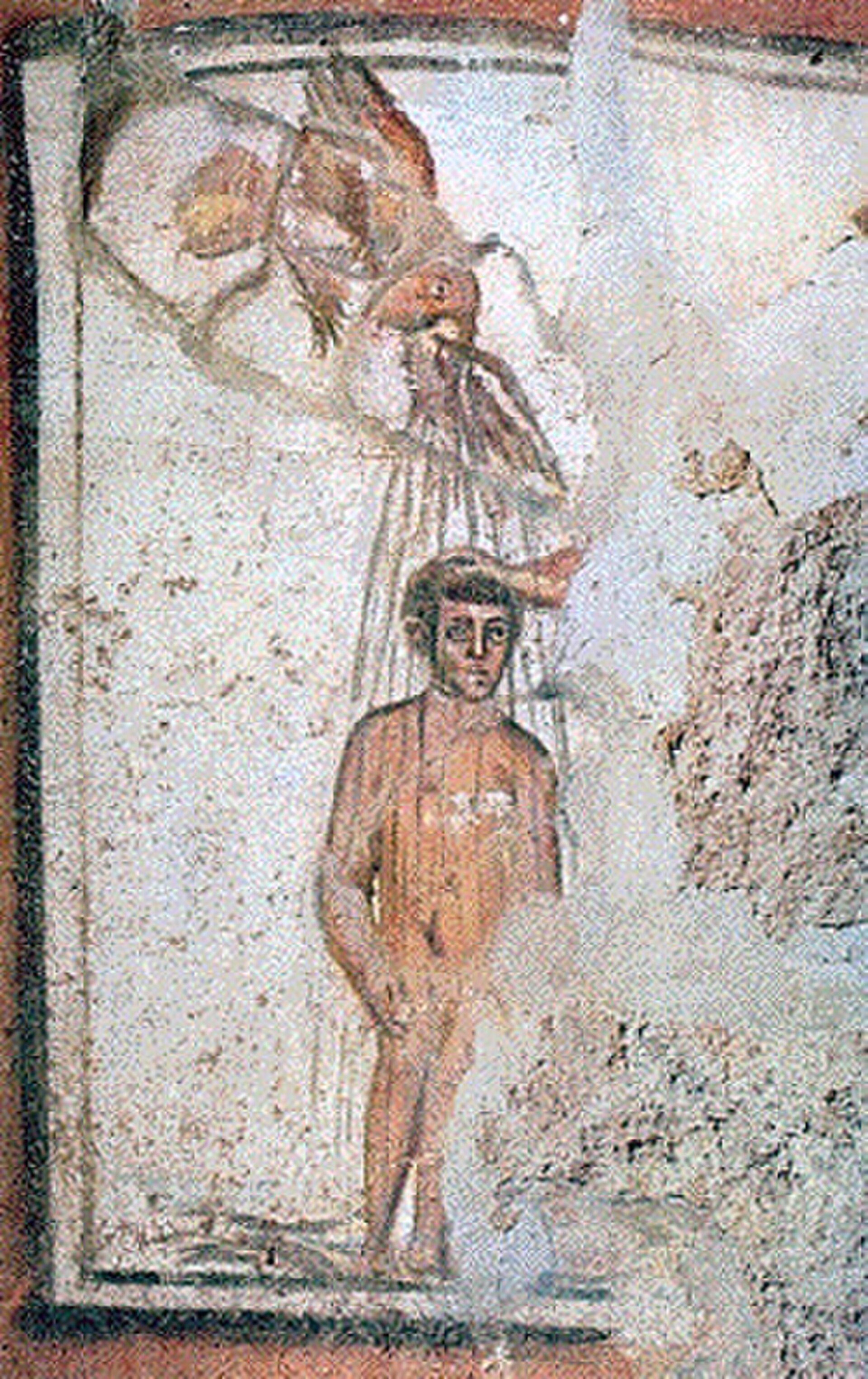Ancient fresco depicting a man with a bird above him, in a historical room.