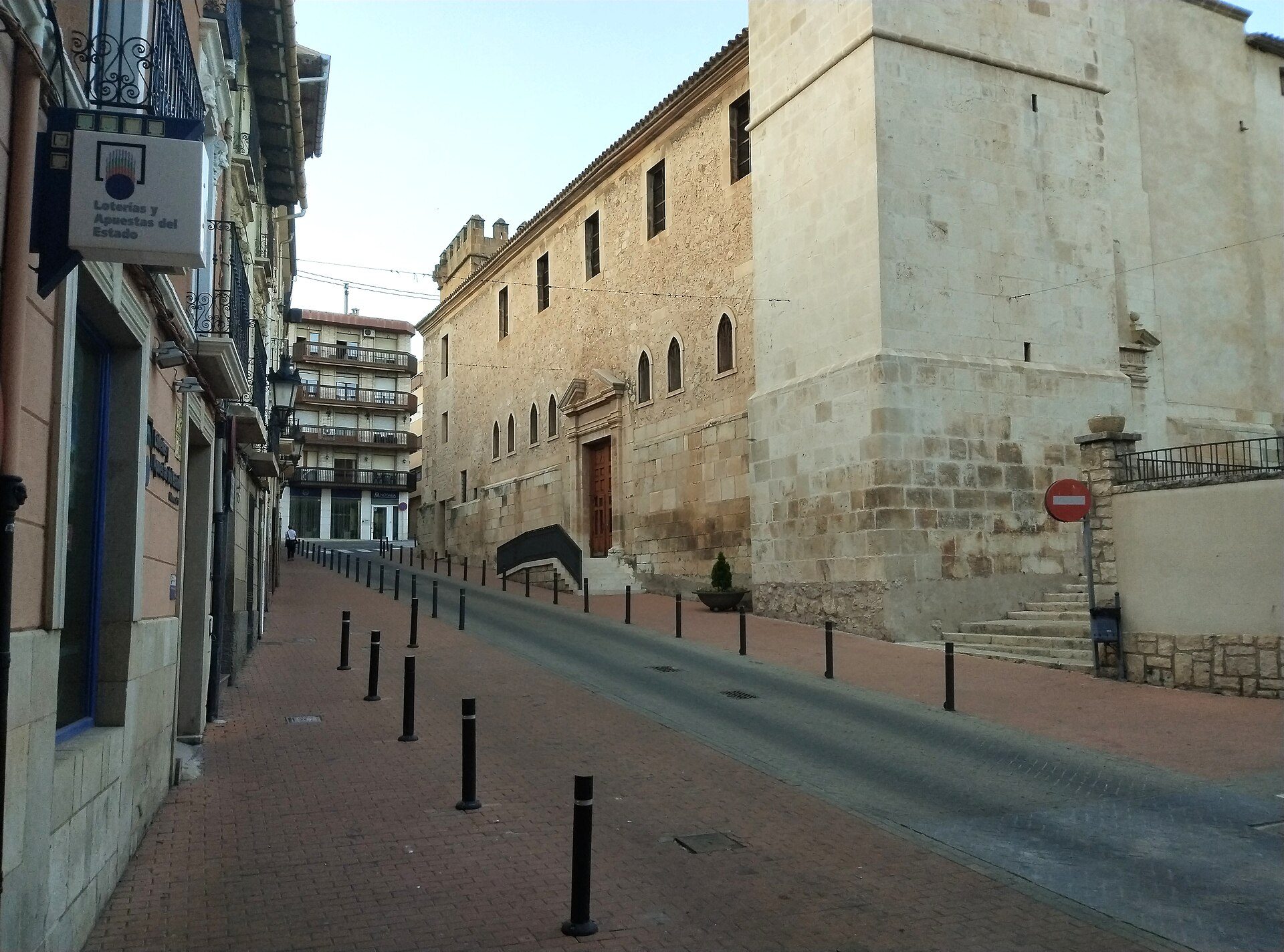 Alt text: Spacious room with city view, featuring large windows and modern decor.