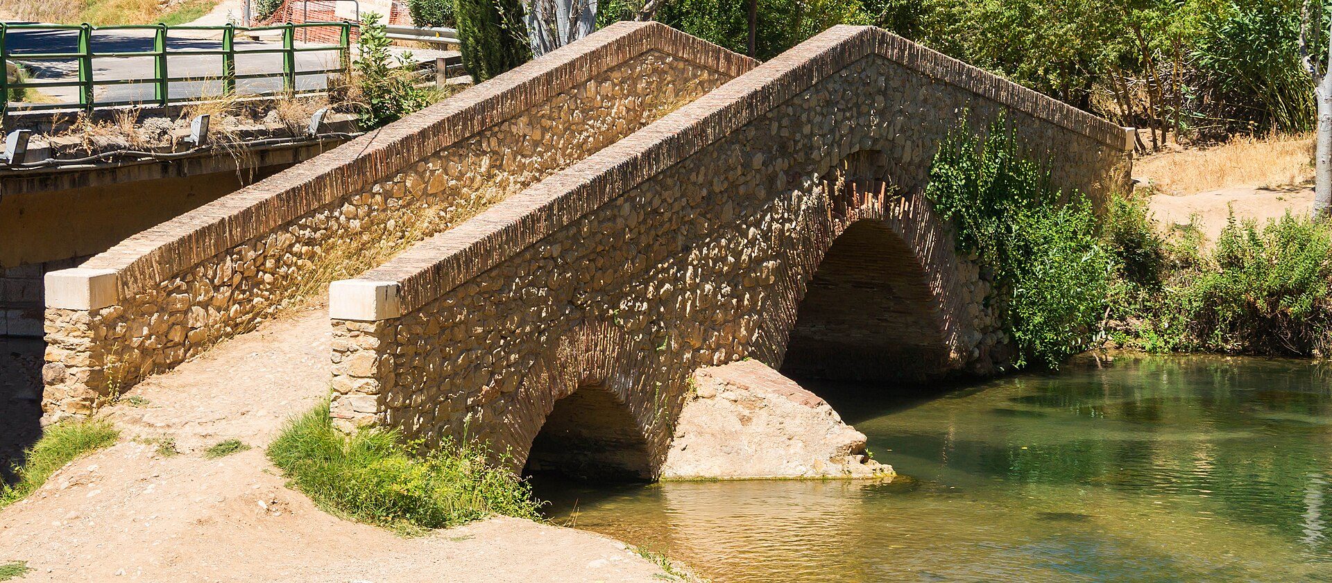 Ancient bridge at Riofrio, on the Frio river, Loja city, Andalusia, Spain.