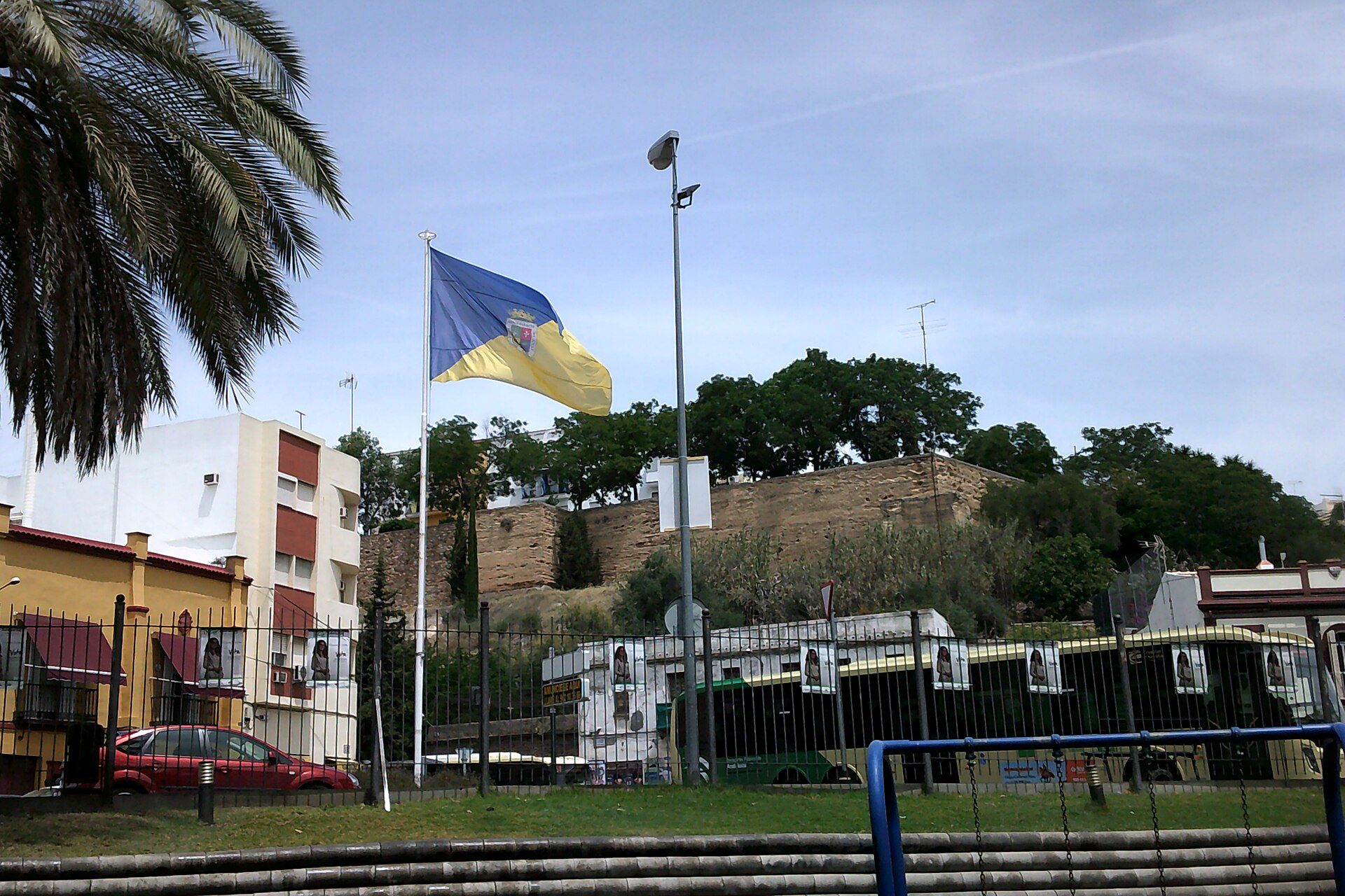 Alt text: Spacious room with city view, balcony, and modern amenities.