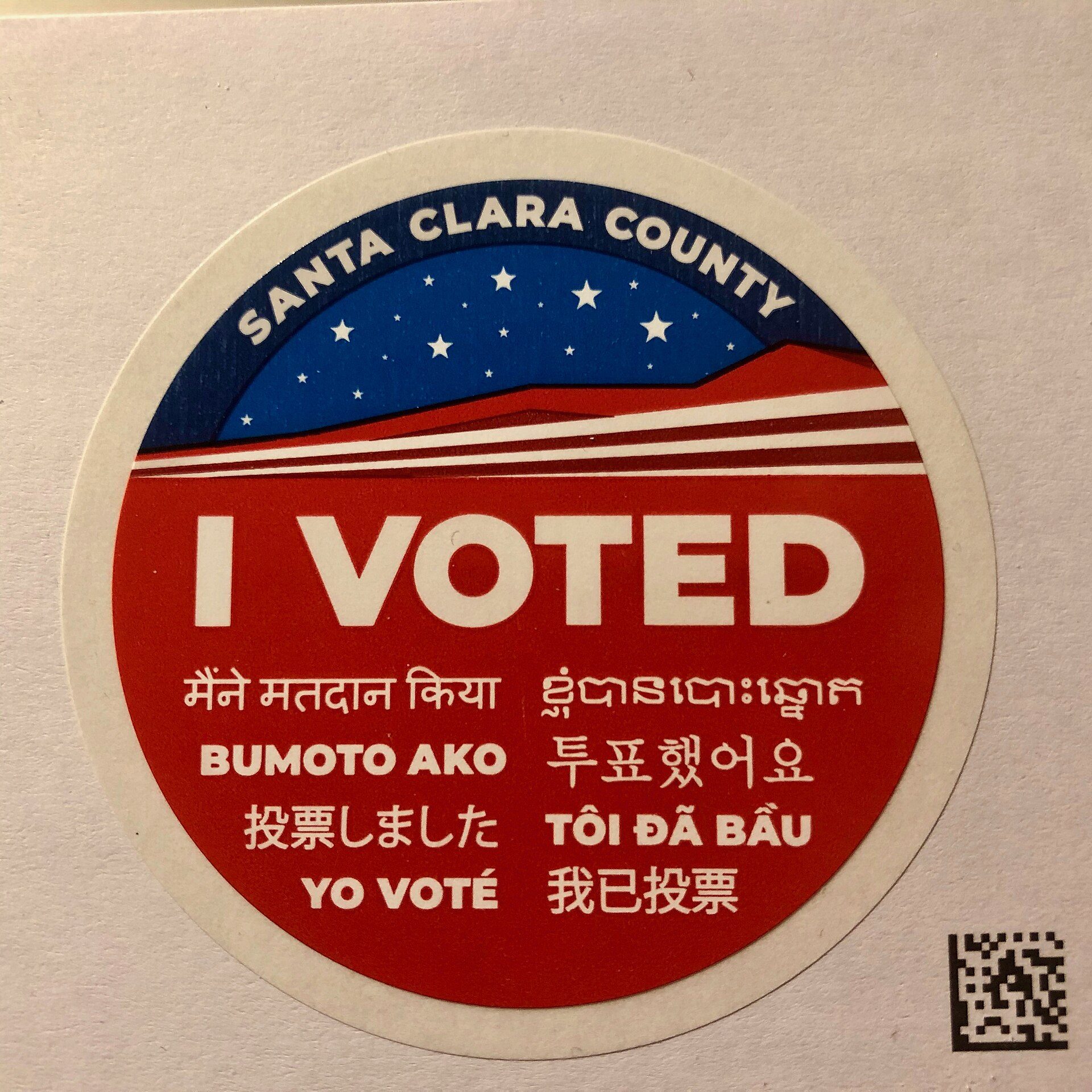 Alt text: Sticker with "I Voted" message in multiple languages, Santa Clara County, California.