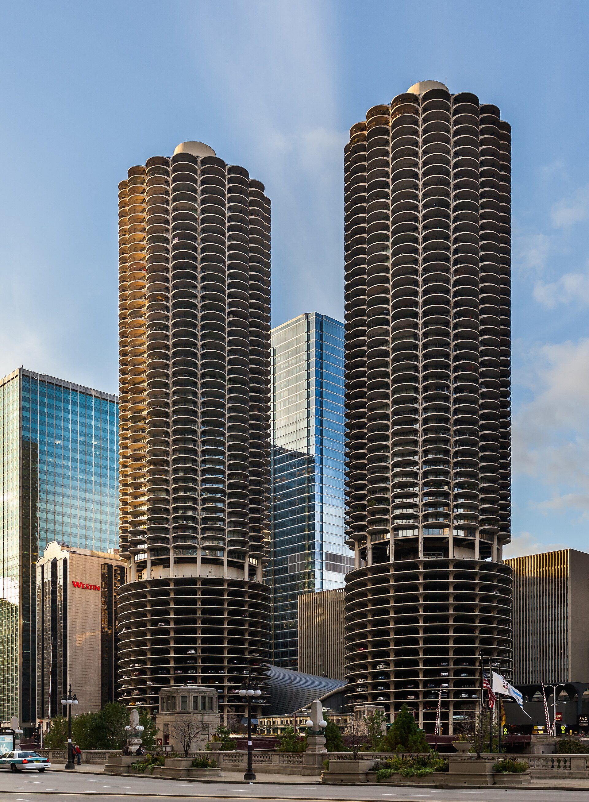 Two modern towers with city views, featuring spacious rooms and balconies.