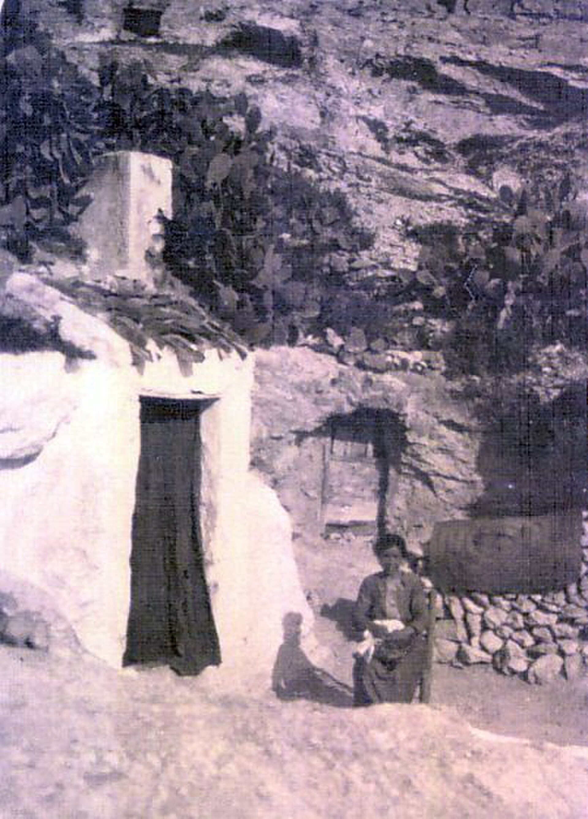 Traditional stone house with a rustic view, simple interior, and a cozy atmosphere.