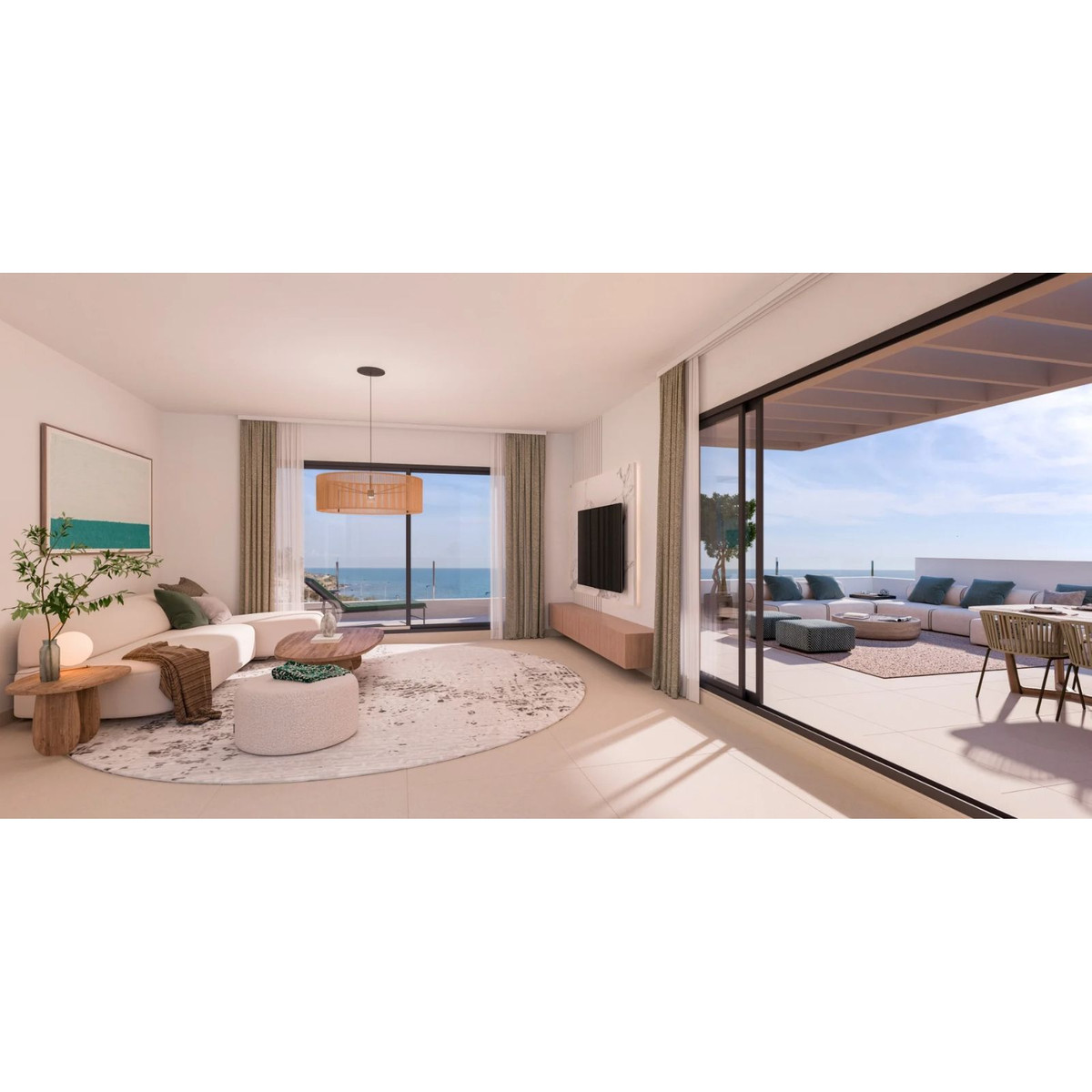 Moderne woonkamer met terras en uitzicht op zee.