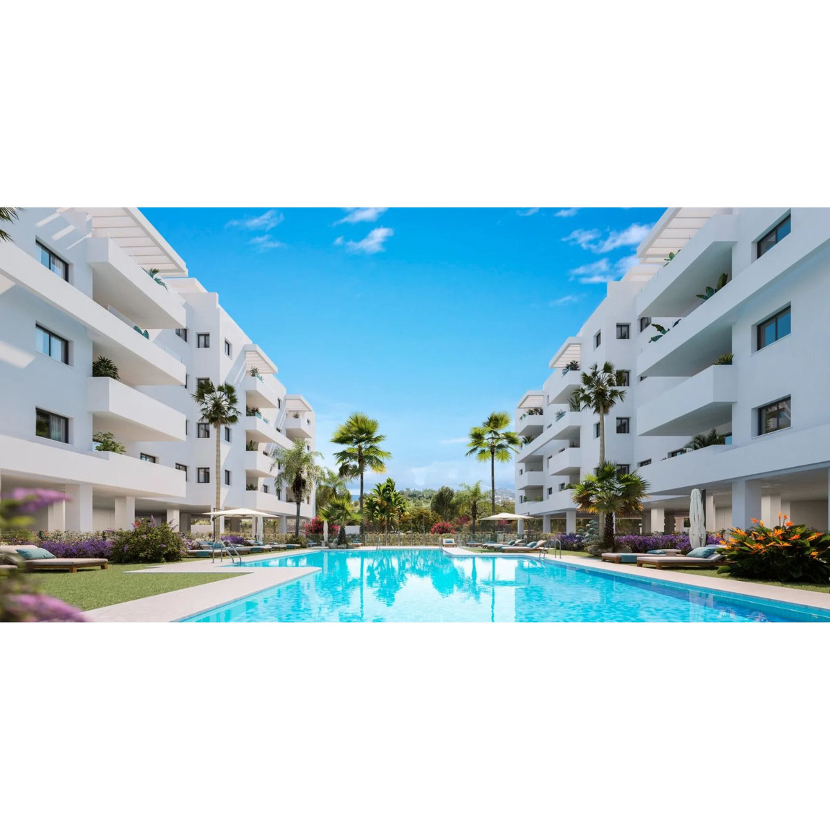 Appartementencomplex met zwembad en tropisch landschap.