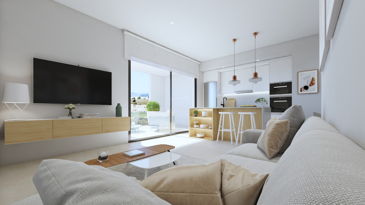 Modern interieur van woonkamer met open keuken en terras