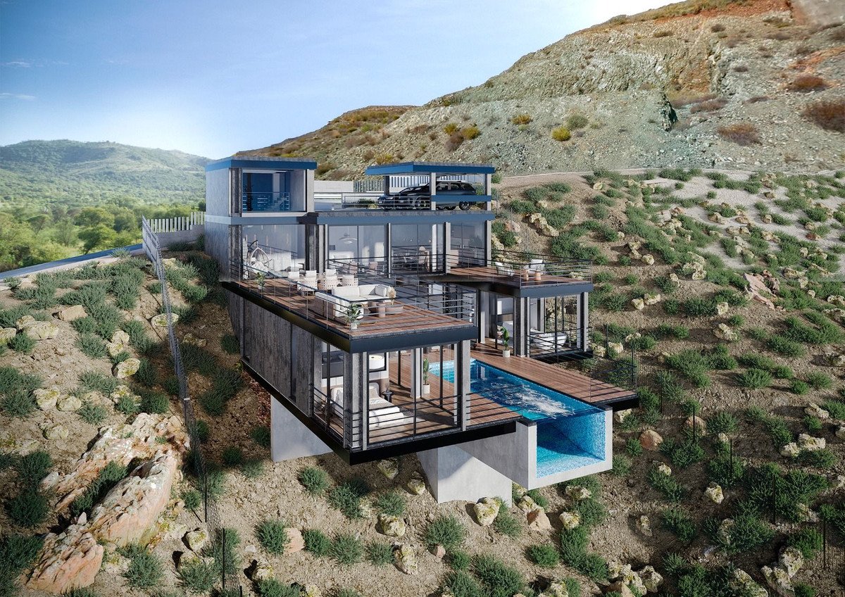 Modern modular home with swimming pool overlooking a scenic hillside
