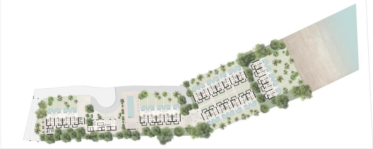 Aerial view of a resort layout with multiple buildings, swimming pools, lush landscaping, and beachfront access.