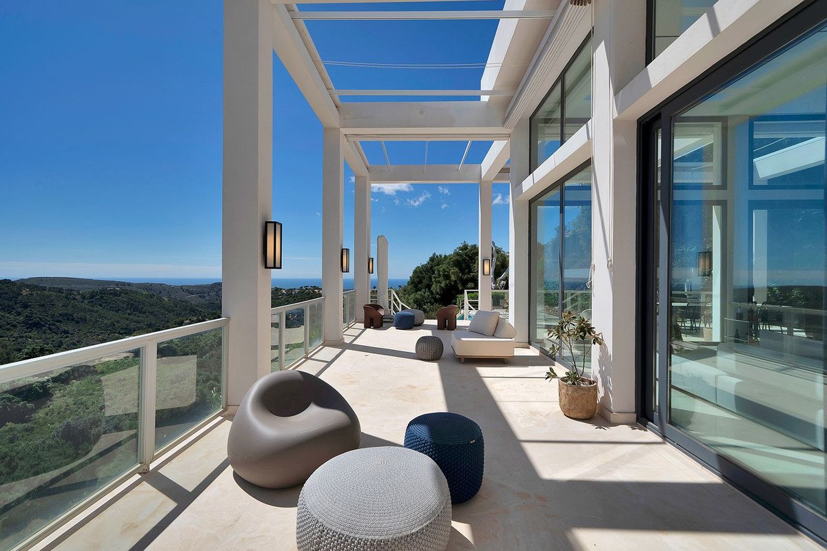 Modern lounge with seating area overlooking the sea