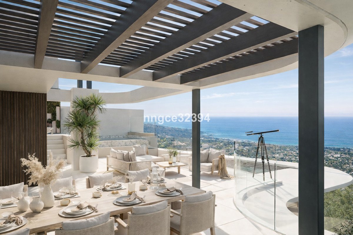 Elegant terrace with dining table and lounge seating, offering panoramic sea views and a telescope.
