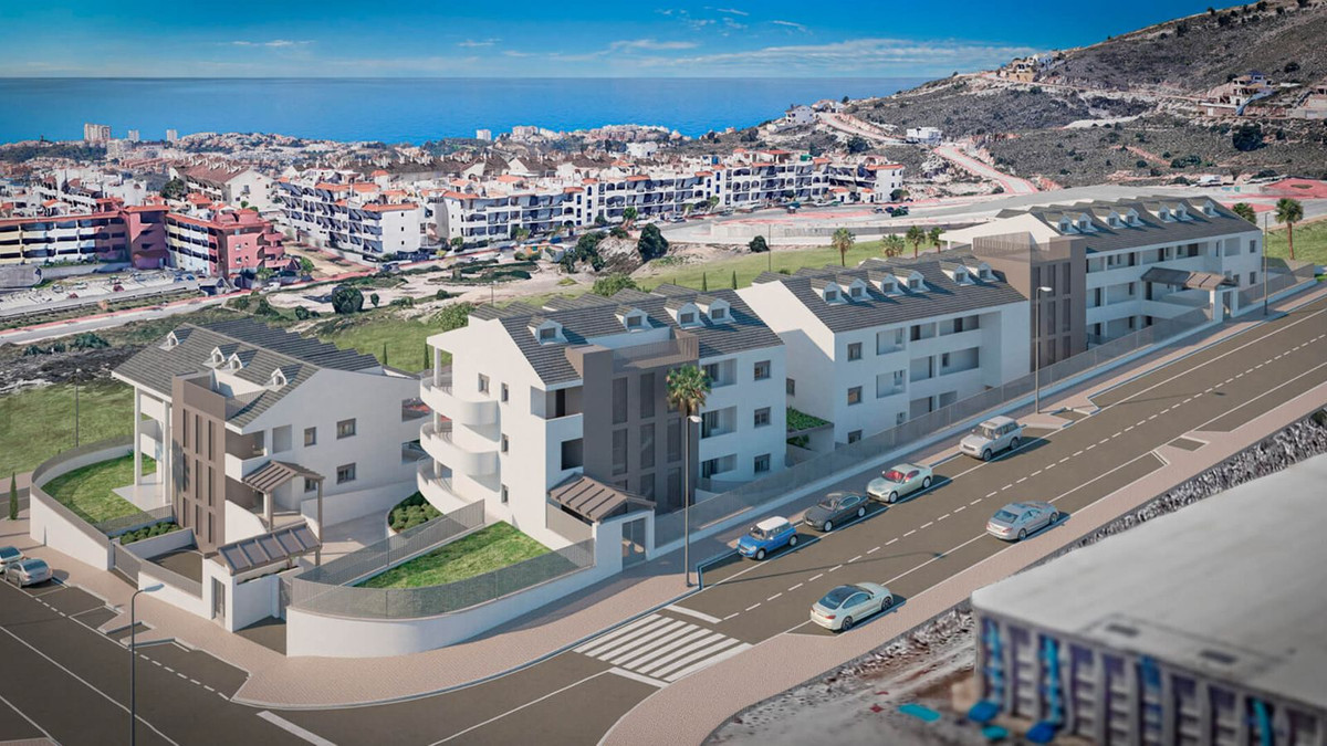 Overzicht van Nexus Residences, een modern wooncomplex met uitzicht op zee.