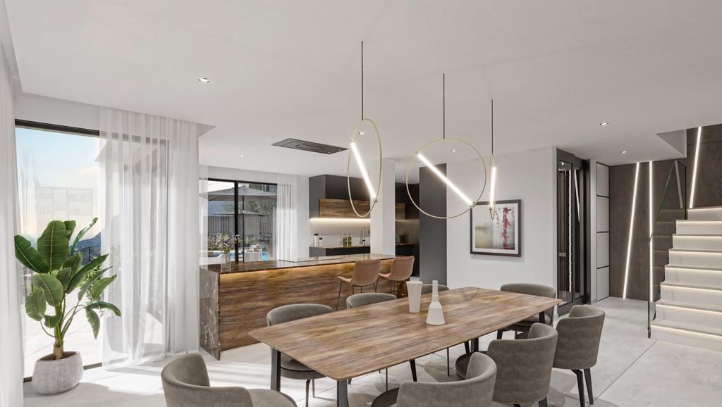 Moderne keuken en eetkamer met houten accenten en veel lichtinval.