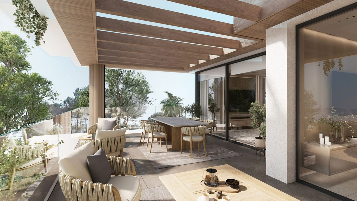 Luxe buiten terras met eettafel en zitmeubelen