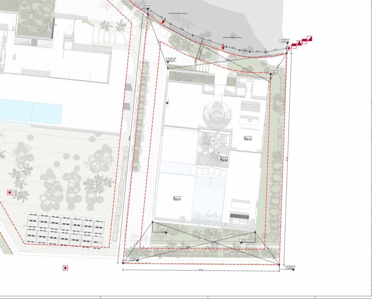 Architectural site plan showing building layout, landscaping, pool, and access points for a property.