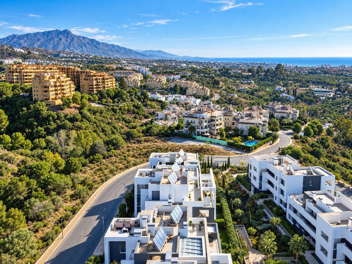 Modern coastal apartments with mountain and sea views, surrounded by greenery