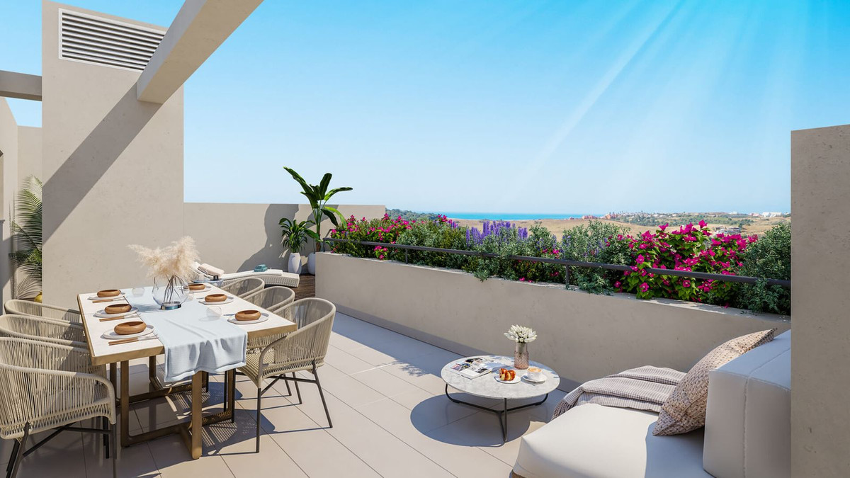 Luxe terras met oceaanzicht en eethoek