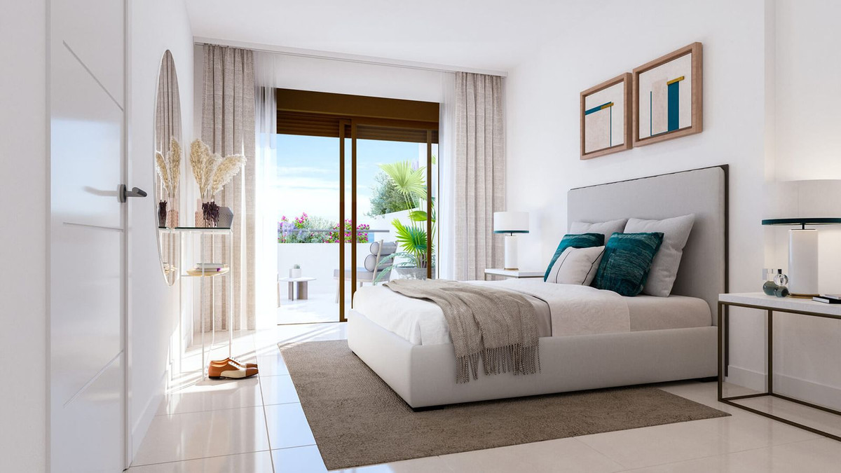 Moderne slaapkamer met balkonuitzicht en veel licht