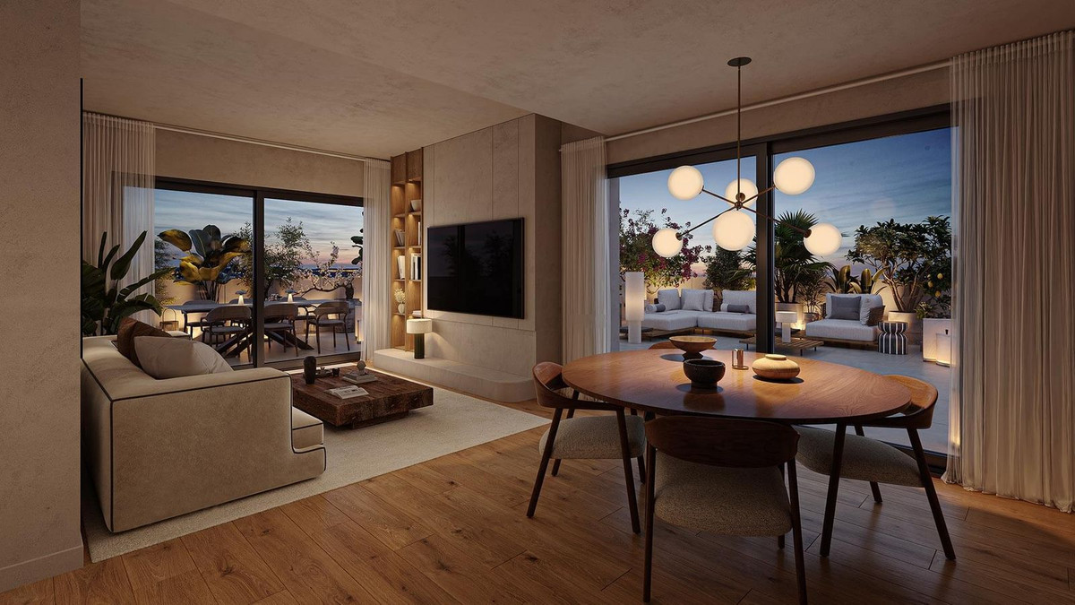 Moderne appartement woon-eetkamer met terras en uitzicht.