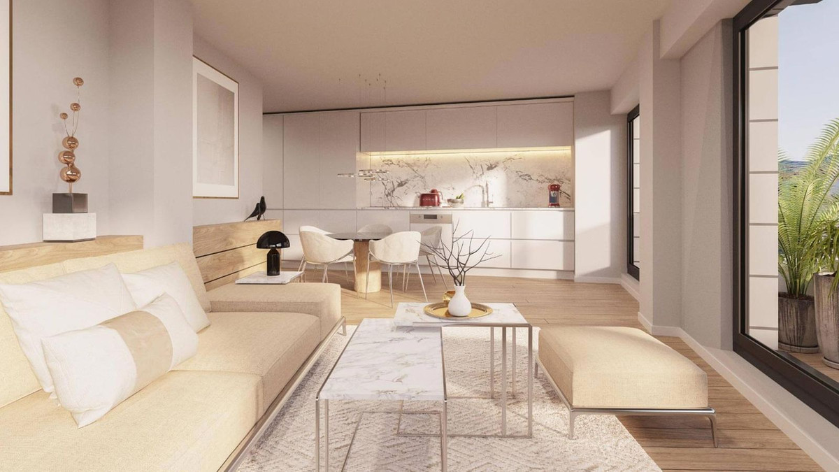 Moderne appartement woonkamer met open keuken en terras.