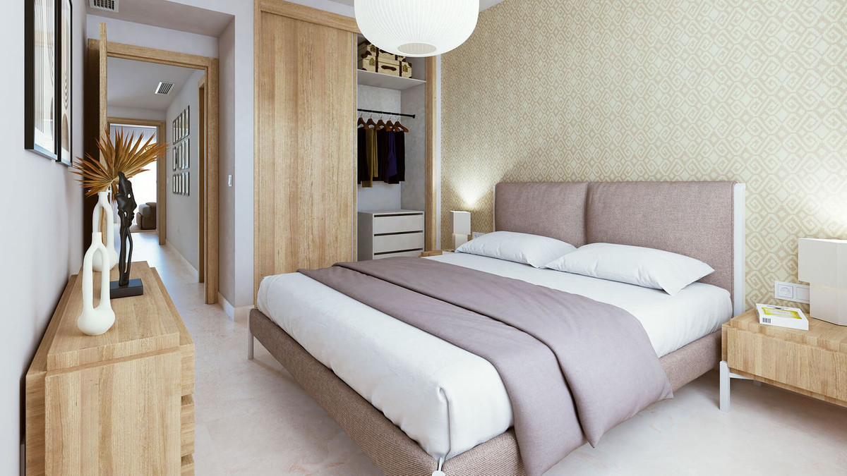 Gezellige slaapkamer met houten accenten en neutraal kleurenpalet.