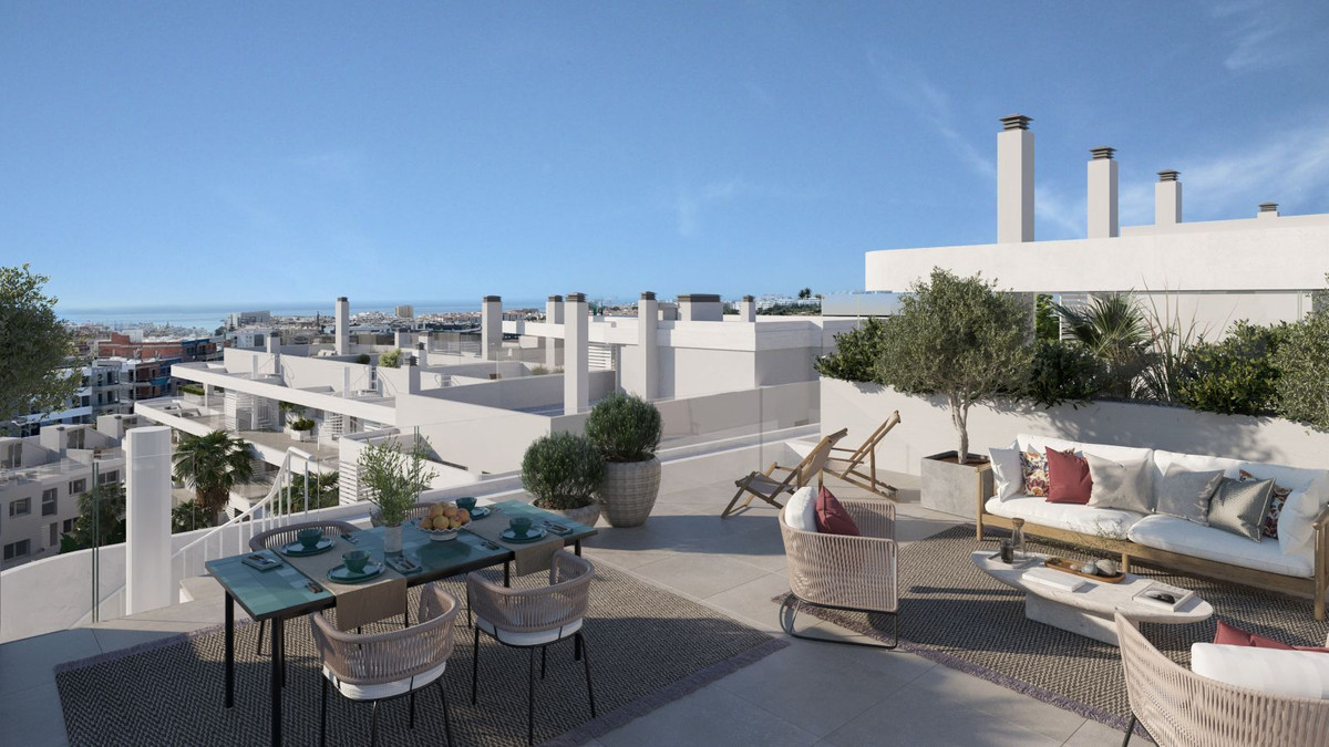 Dakterras met uitzicht bij Anna de Estepona herenhuizen.