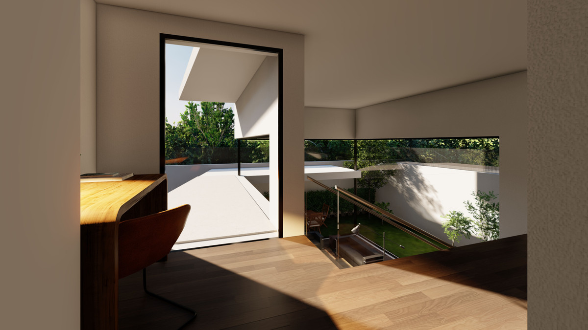 Modern interieur met trap en uitzicht op de tuin.