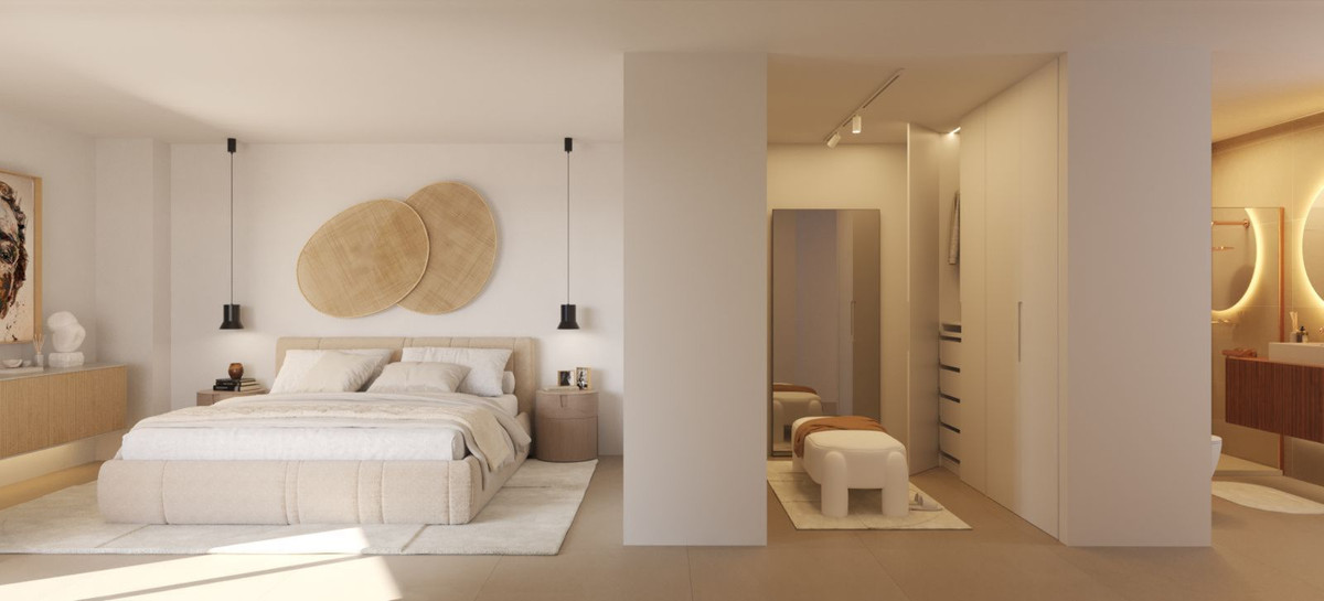 Slaapkamer met en-suite badkamer en kleedkamer in Torre Biznaga