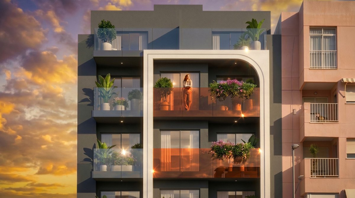 Modern apartment building balconies with plants and sunset sky. A woman stands on one balcony.