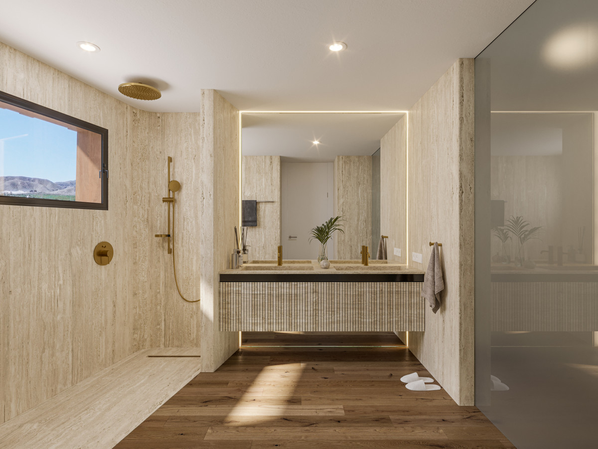 Moderne badkamer met stenen muren, houten vloer en dubbele wastafel