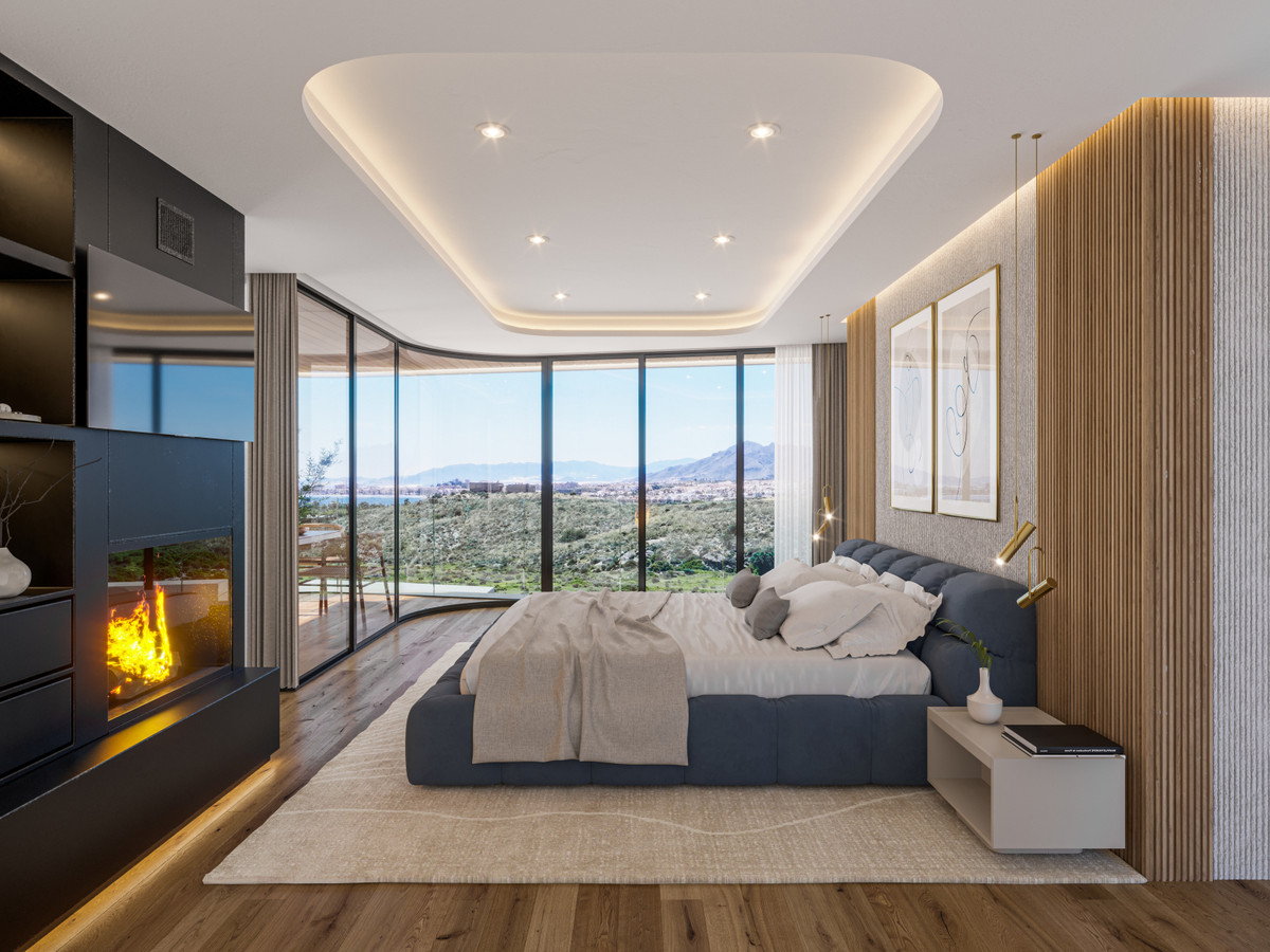 Luxe slaapkamer met panoramisch uitzicht en open haard