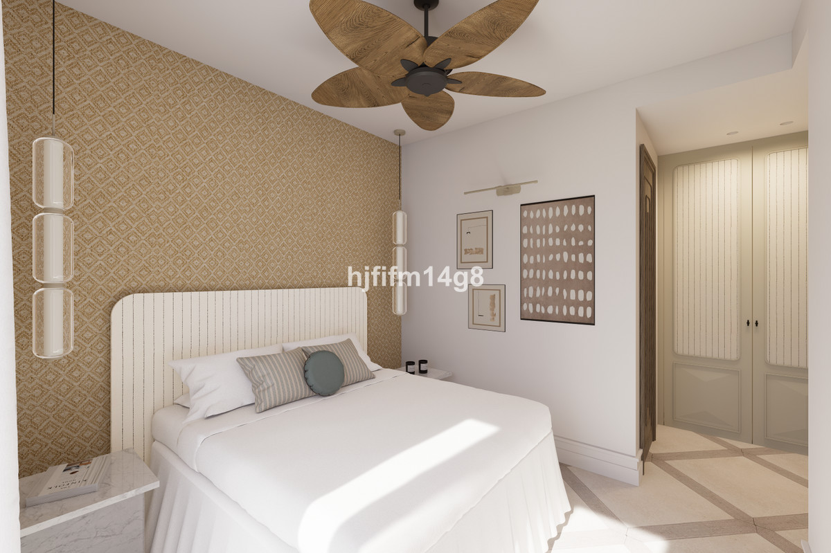 Stijlvolle slaapkamer met modern interieur en een comfortabel bed.